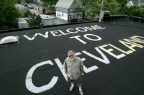 Mark Gubin has maintained a Welcome to Cleveland sign painted on the roof of his building since  the building is located near Mitchell International Airport in Milwaukee Wisconsin