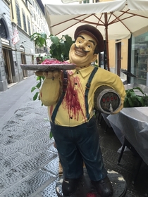 Melted candle wax makes this statue look like a murderer