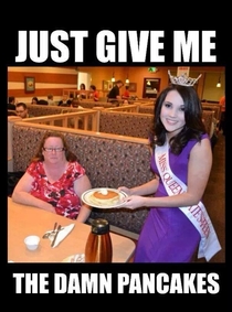 Miss world serve a meal to a women