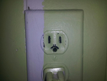 Mom painted over the electric socket Now he has a mustache