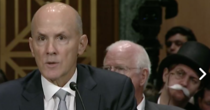 Monopoly Man in background during Equifax Senate Hearing