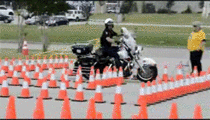 Motorcycle cop on obstacle course