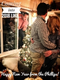 My best friend decided to come through the window right as my wife and I were taking our New Years photowe rolled with it