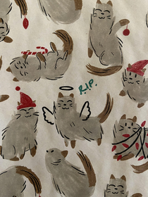 My boyfriend pointed out that the festive wrapping paper I bought has dead cats on it Happy holidays everyone RIP