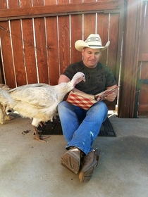 My brother going over Thanksgiving recipes with Gobbles the Turkey