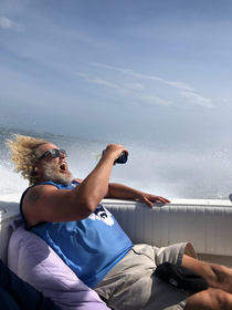My buddy trying to drink a beer on the high seas