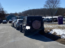 My classmate put his face on his tire cover