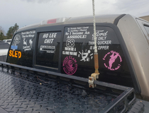 My co-worker has a lifted truck with window stickers that suit his point of view We took the liberty of adding a couple hot pink enhancements