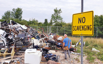 My dad hunting for my birthday present at the local dump