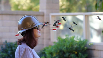 My Dad in law invented this hummingbird helmet He calls the feeder in the back The Tickler