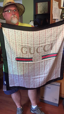My dad ordered a pair of hiking boots and got this  USD Gucci silk scarf instead Hes thrilled
