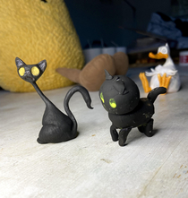 My daughter and I made some black cats out of clay for Halloween