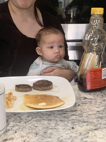 My daughter contemplating joining the Church of Breakfast