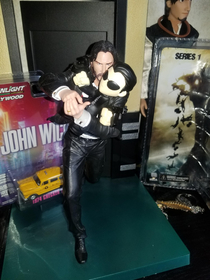 my daughter loves to play with the figures on my bookshelfI just noticed john wick had a replacement for his gun