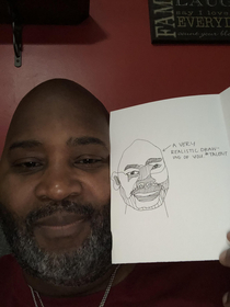 My daughter made me a card for Fathers Day with realistic drawing of me I think Evander Holyfield is her dad