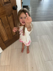 My daughter showing me the finger that she hurt today