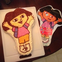 My daughter wanted a Dora the Explorer birthday cake I accidentally didnt put enough food coloring in the icing so she got Laura the Explorer