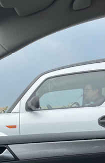 My dude out here playing French horn on the freeway