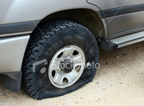 My employee told me that he couldnt get to work because he had a flat tire This is the picture he texted me