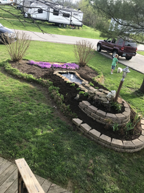 My father made this really nice landscaping in his front yard And then he stood back and realized what he had done