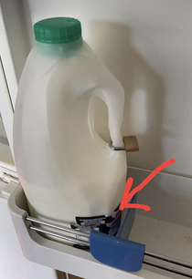 My flat mate has taken the security of the milk in next level He cut one milk bottle into half and put on top of the new one and lock it so nobody can try to steal milk from him