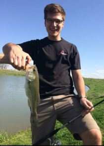 My friend caught a fish and wanted to take a picture with it but was to scared to hold it so