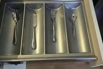 My friend lives alone this is his utensil drawer