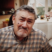 My friend stuck a black dot on her dads face and now he looks like Robert De Niro