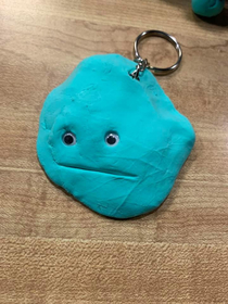 My friends little kid made her this Pizza keychain