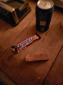 My friends were playing jenga and I bit a block of wood sitting next to my snickers bar I was kinda drunk