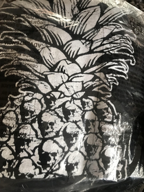 My future daughter-in-law loves pineapples so I thought I had did a great job picking out this shirt for her until I got it in the mail and saw the pineapple up close
