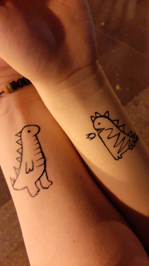 My girlfriend and me just got our dinosaur spirit animals tattooed