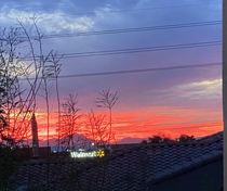 My girlfriend knew we moved into the right apartment when she saw the view of the Walmart at sunset