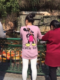 My girlfriends in China she sent me photo of girl wearing Mickey Mouse shirt but somethings not quite right