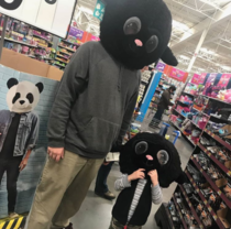 My girlfriends son demanded we take a picture with these masks on Very hard decision not to buy them