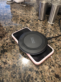 My grandma is still getting used to her new wireless charger