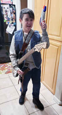 My guitar playing  year old son as Han Guitar Solo for Halloween Almost all of his costume came from my closet 