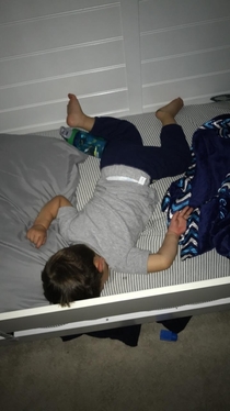 My kid sleeps like he fell down in Family Guy