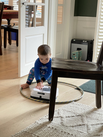 My kid torturing our robot mop is how the robot revolution starts