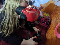 My kids been bugging the crap out of me for a VR rig Shes  I gave her this  Virtual boy and told her we had VR at home