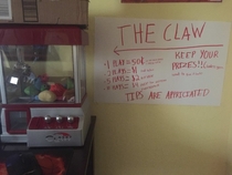 My little brother made a sign to show the prices to use his mini claw machine
