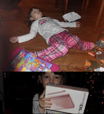My little sister opening her Nintendo DS lite on Christmas Day  Those were the days