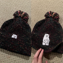 My mom bought this cute little kitty hat for me without looking at all of the photos