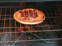 My mom missed the bit where it said place on pizza pan or stone