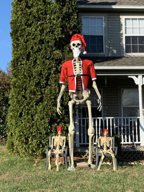 My neighbors getting their moneys worth on their giant skeleton Part  Santas Here to Slay
