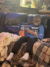 My nephew enjoying a few early Christmas gifts