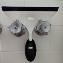 My OXO bathroom squeegee created a face