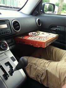My  Scion has a built-in pizza holder