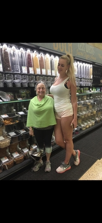 My short mom sends our family photos of her with really tall people