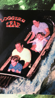 My sister holding on for dear life on the log flume